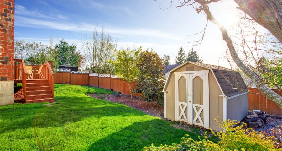 Fenced backyard with storage shed in Pittsburgh